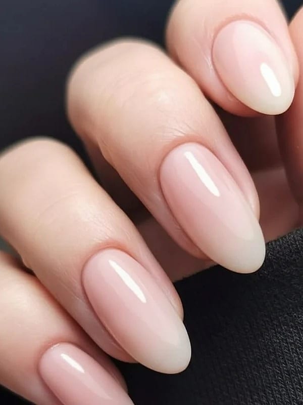 Milky glazed neutral office manicure with a soft sheer finish at Palace Nail Spa in Midtown Tallahassee