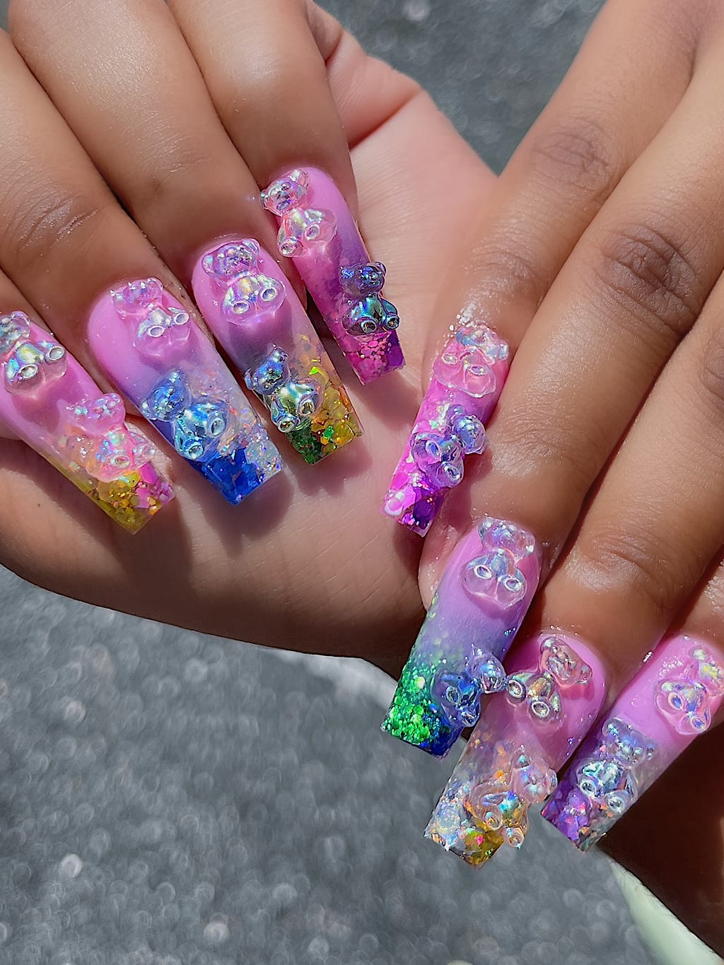 Pink ombre coffin nails with holographic glitter and gems at Palace Nail Spa in Midtown Tallahassee