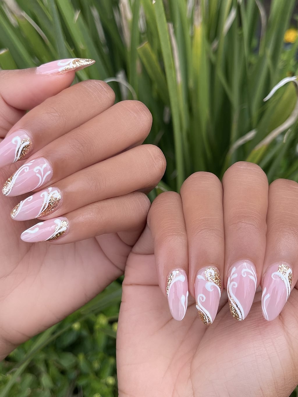 Sheer pink and white nails with a delicate gold swirl at Palace Nail Spa in Midtown Tallahassee