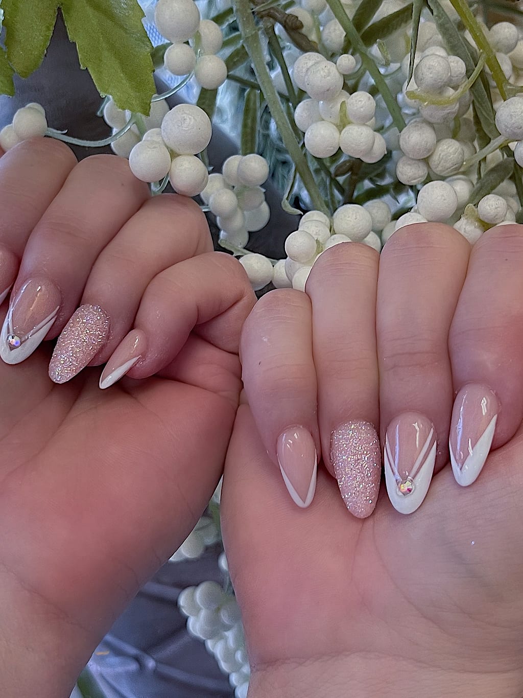 Nude and white French set with a soft glitter accent at Palace Nail Spa in Midtown Tallahassee