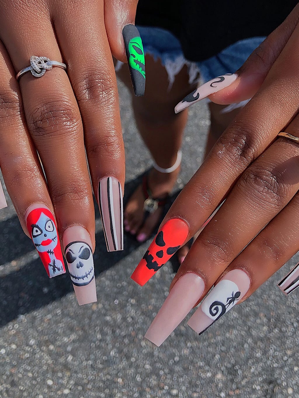 Nude coffin nails feature black skull and gothic art at Palace Nail Spa in Midtown Tallahassee