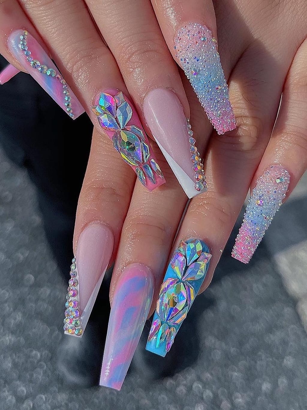 Chrome holographic coffin nails with glittery nude base at Palace Nail Spa in Midtown Tallahassee